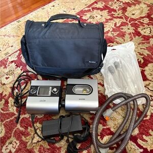 ResMed S9 Series or H5i. CPAP Machine. Black and Silver Devices. Travel bag.